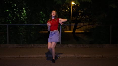 Girl-energetically-dances-in-the-nigh