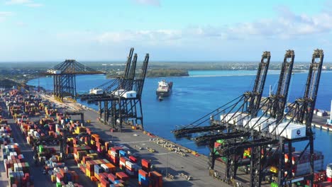 Panoramic-view-of-the-arrival-of-a-cargo-ship-at-the-port-of-Cuacedo,-Dominican-Republic