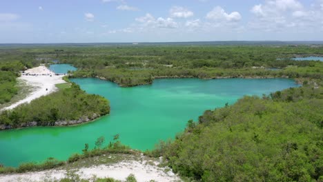 Scenic-shot-of-one-of-the-attractions-of-Cap-Cana,-El-Lago-Azul-,-an-ideal-place-to-share-with-the-family,-seen-with-a-drone