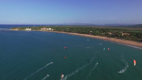 Aerial-panoramic-shot-of-kitesurf-at-Cabarete-beach,-Dominican-Republic