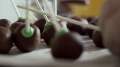 Close-up-slow-motion-of-pile-of-chocolate-cake-pops