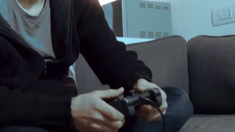 Hands-Holding-Video-Game-Console-Controlling-Joystick