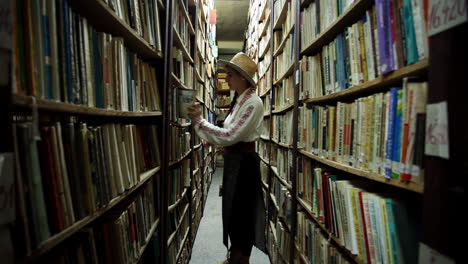 Romanian-girl-visits-the-old-library-in-Resita,-Romania-10