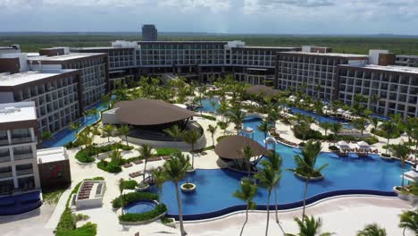 Scenic-flight-backwards-with-drone-highlighting-the-Hyatt-Zilara-hotel-in-Juanillo-Cap-Cana,-devastated-by-the-pandemic