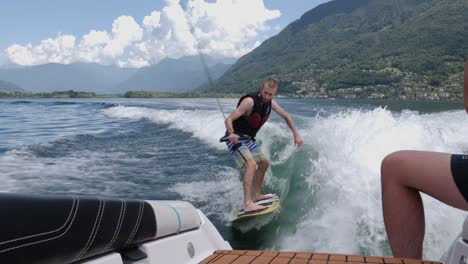 Guy-wakeboarding-on-lake-Maggiore-in-Switzerland