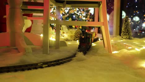 A-toy-Christmas-train-riding-around-the-track