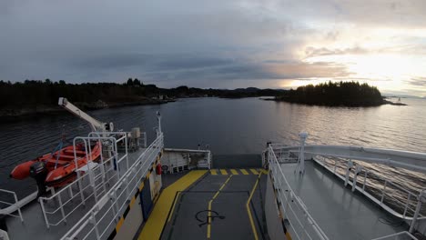 Timelapse-of-Electric-Norwegian-car-ferry-sailing-narrow-waters-at-dawn-sunset