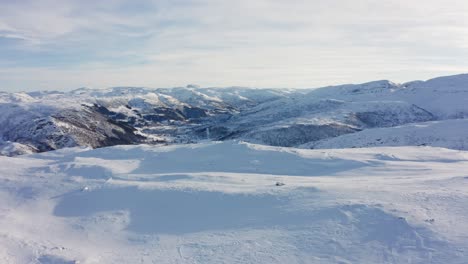 Distant-cast-away-tourist-lost-at-Bergsdalen-mountain-peak-Hamlagro-Norway