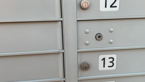 Canadian-post-Canada-mail-boxes-courier-close-up-of-mailboxes-for-sub-urban-community-neighborhood-for-mailing-and-shipping-letters,-cards,-and-online-shopping-for-receiving-small-items