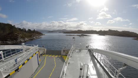 Electric-zeero-emission-passenger-ferry-sailing-through-narrow-waters-first-person-view-from-deck---Norway