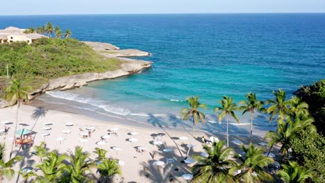 Aerial-view-over-breathtaking-Caribe-beach,-Santo-Domingo