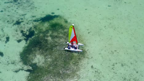 Sailboat-On-Clear-Tropical-Water-In-Summer