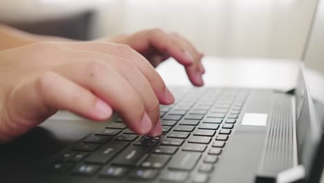 Detail-of-male-hands-working-on-laptop