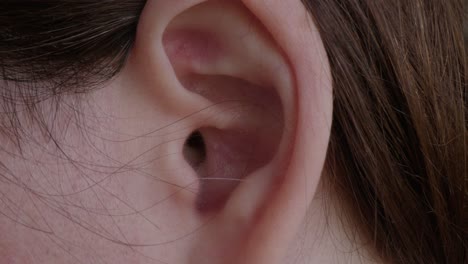 Close-Up-Pan-of-a-Woman's-Ear