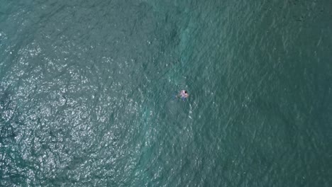 Boy-swimming-at-the-coast-of-Maui