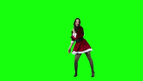 Attractive-female-dancer-dancing-in-front-of-the-green-screen