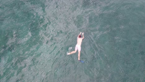 Boy-snorkeling-in-beautiful-water-in-Hawaii