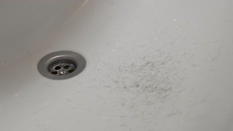 Body-hair-falling-in-a-bathroom-sink