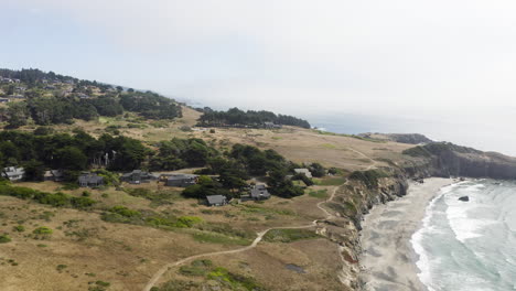 Wide-aerial-push-in-over-the-coasts-of-Sea-Ranch,-California