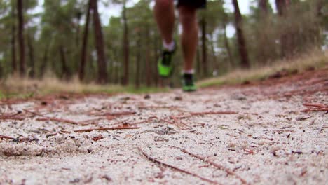 Runner-Running-Toward-camera-in-Forest-with-Sneaker-Detail