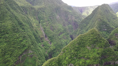 Aerial-view-over-the-dramatic-landscape-around-Takamaka-waterfalls-and-Marsouins-River,-Reunion-Island