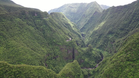 Aerial-view-over-mountains-on-Reunion-Island-with-the-Takamaka-waterfalls-and-Marsouins-River-below