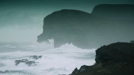 Epic-angry-ocean-waves-pounding-the-rocks-at-Ponta-dos-Capelinhos,-Azores