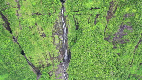 Dramatic-aerial-view-over-the-Takamaka-waterfalls-on-the-Marsouins-River,-Reunion-Island