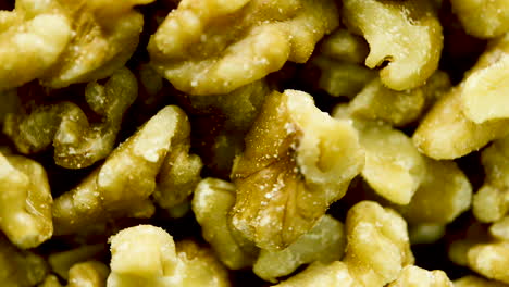 Close-up-of-shelled-walnuts-pieces-rotating