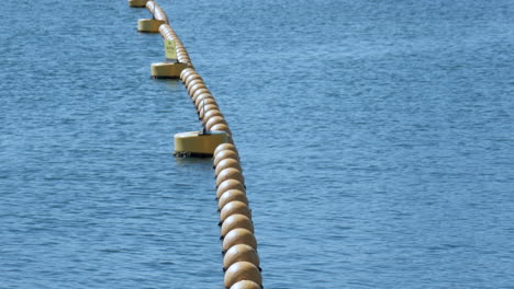 Endless-sea-view-with-a-chain-of-yellow-coloured-buoys