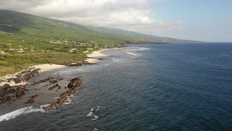 Drone-flight-over-the-ocean-and-rugged-coastline-of-the-Trois-Bassins-area-on-Reunion-Island
