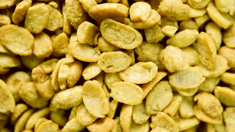 Close-up-of-dry-toasted-soybeans-halves-rotating