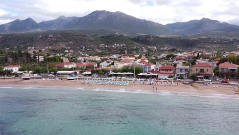 Stoupa-Beach-during-Late-Summer-at-Peloponnese,-Greece---Aerial