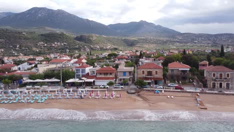 Stoupa-Beach-Town-during-Late-Summer-at-Peloponnese,-Greece---Trucking-Sideways