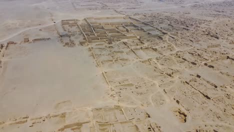 Aerial-drone-footage-of-archaeological-site-called-"Cajamarquilla"-in-Lima,-Peru