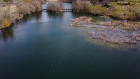 Aerial-shot-of-lake-pond-in-norfolk-island-carp-fishery-pond