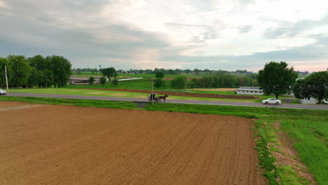 Aerial-approach-towards-Amish-horse-and-buggy
