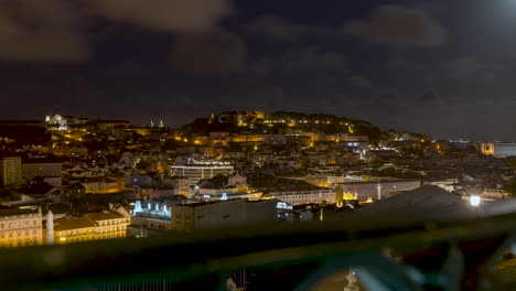 Time-Lapse-in-Lisbon-with-view-of-São-Jorge-Castle,-night