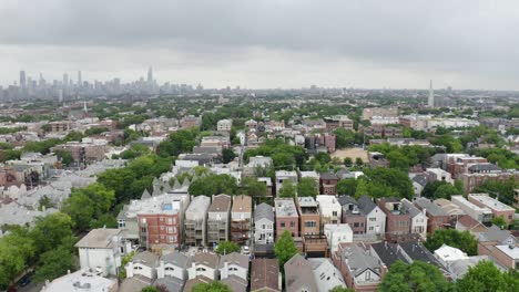Drone-Flying-Away-from-Rows-of-Urban-Houses-in-Chicago