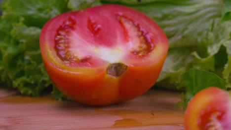Beautiful-slow-motion-shot-of-a-man-just-finished-cutting-a-tomato