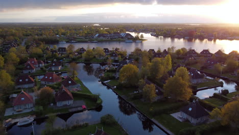 Aerial-video-footage-of-the-village-Eernewoude-and-bungalow-park-It-Wiid,-Friesland,-The-Netherlands