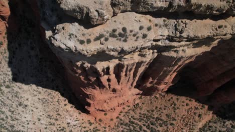 Aerial-drone-view-of-an-awesome-rock-formation-in-a-red-dessert-canyon-in-Teruel,-Spain