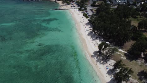 4K-cinematic-counterclockwise-drone-shot-of-crystal-clear-blue-water-at-Kailua-Beach-on-the-Island-of-Oahu
