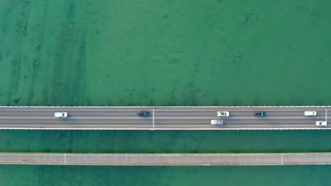 Downwards-aerial-view-of-traffic-on-the-Barwon-Heads-Bridge,-Victoria-Australia