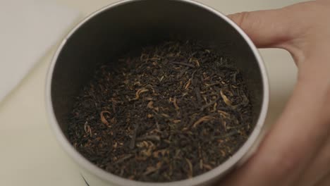 Green-tea-ingredient-for-kombucha-drink-inside-metal-can