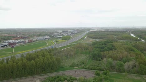Aerial-drone-view-of-the-panorama-of-the-A6-highway-or-motorway-in-the-Netherlands,-Europe