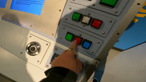 Pushing-buttons-on-an-aircraft