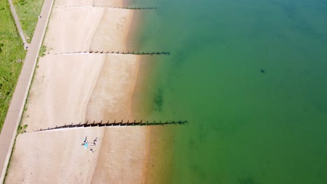 A-fast-aerial-birds-eye-view-flyover-of-Tankerton-beach