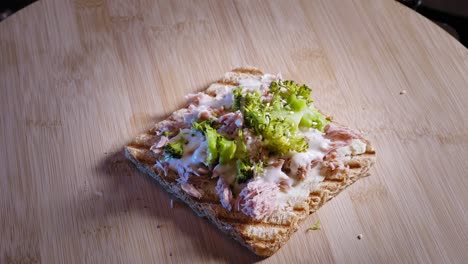 Anabolic-Toast-Sandwich-With-Tuna-And-Broccoli,-Sprinkled-With-Sesame-Seeds