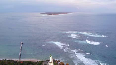 Aerial-view-from-Point-Lonsdale-looking-over-the-lighthouse,-and-Port-Philip-Bay-heads-towards-Point-Nepean